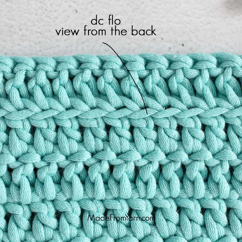 making a row of dc flo will create a ridge at the back of the crochet piece.