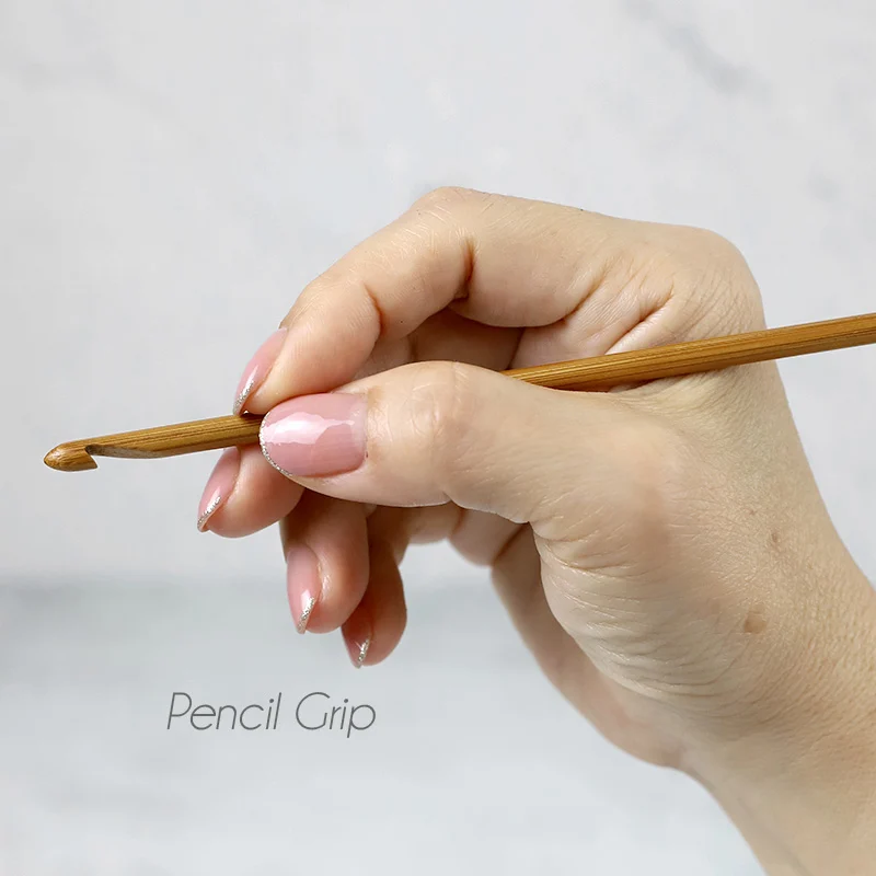 hold crochet hook in pencil grip