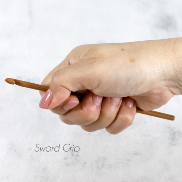 hold crochet hook in sword grip