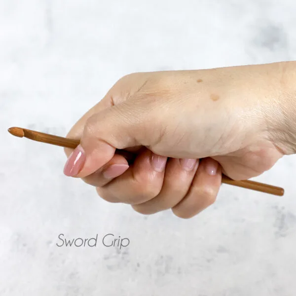 hold crochet hook in sword grip