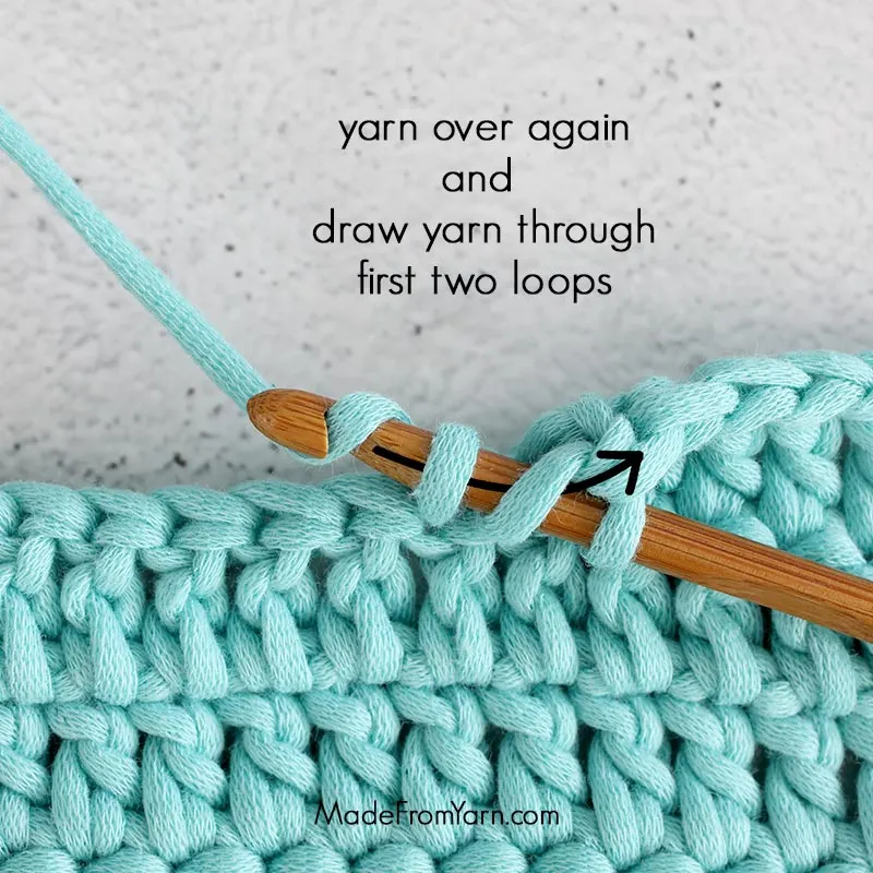 how to crochet dc stitch step 5, yarn over and draw yarn through the first 2 loops.