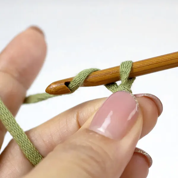 yarn over the working yarn on the hook