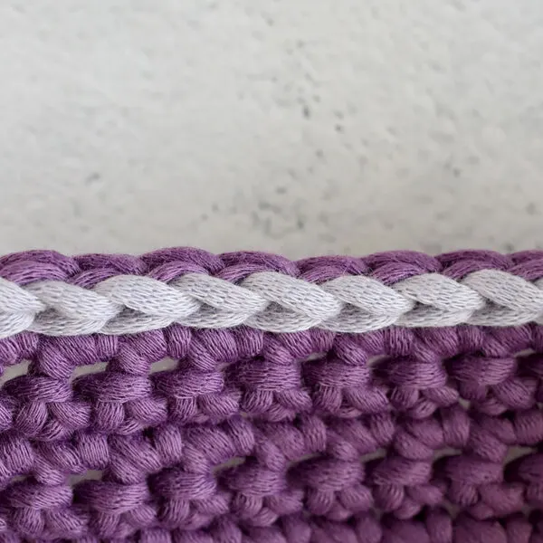 slip stitch along the edge of your crochet piece to add thickness and texture