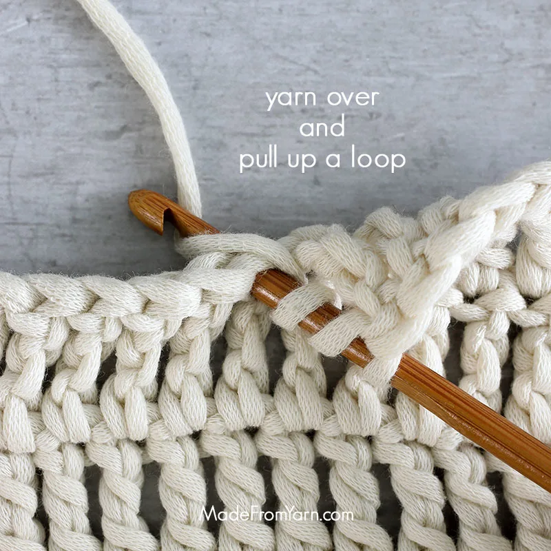 how to crochet tr stitch step 2, yo again and pull up a loop