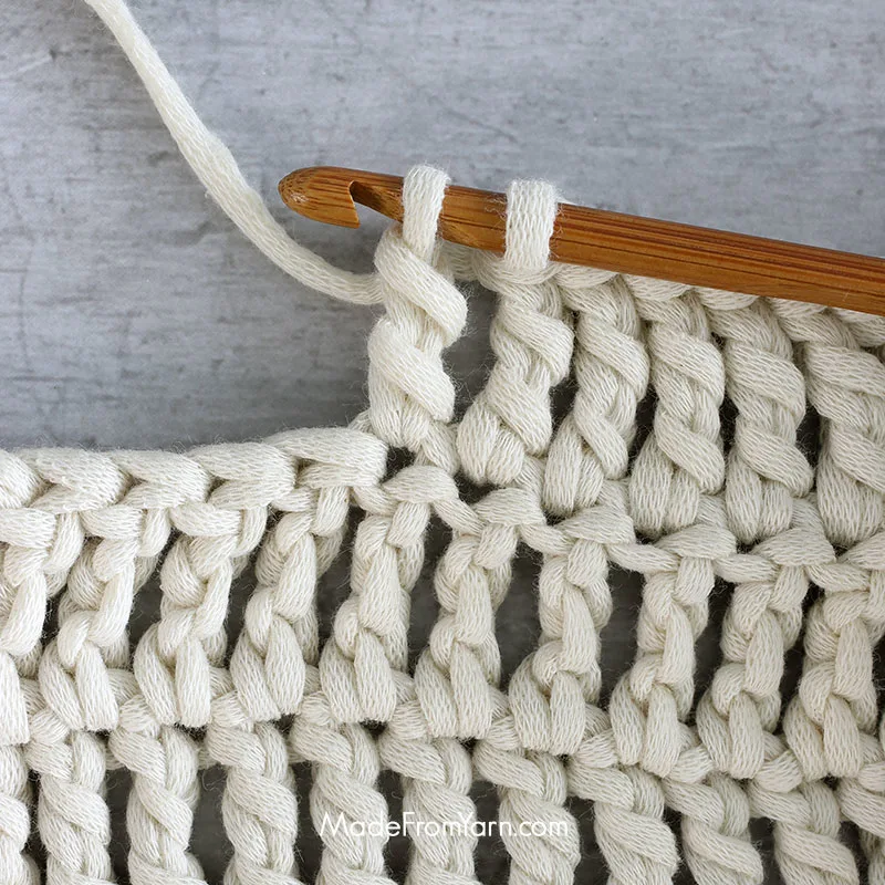how to crochet tr stitch step 7, yo again and draw through another two loops