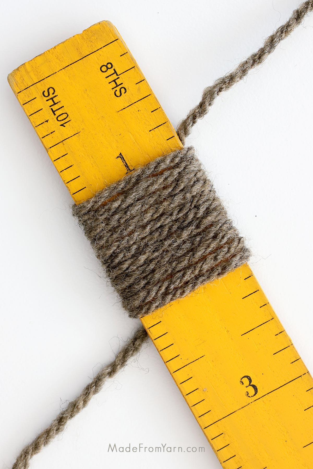 How to measure WPI using a ruler:

Grab a ruler and a section of the yarn;

Start at the beginning of the ruler and wrap the yarn snugly around it without overlapping;

Count the number of times the yarn wraps around the ruler or tool within one inch. Each wrap represents one WPI;

Compare the number of wraps per inch to the conversion chart above to determine the yarn category.