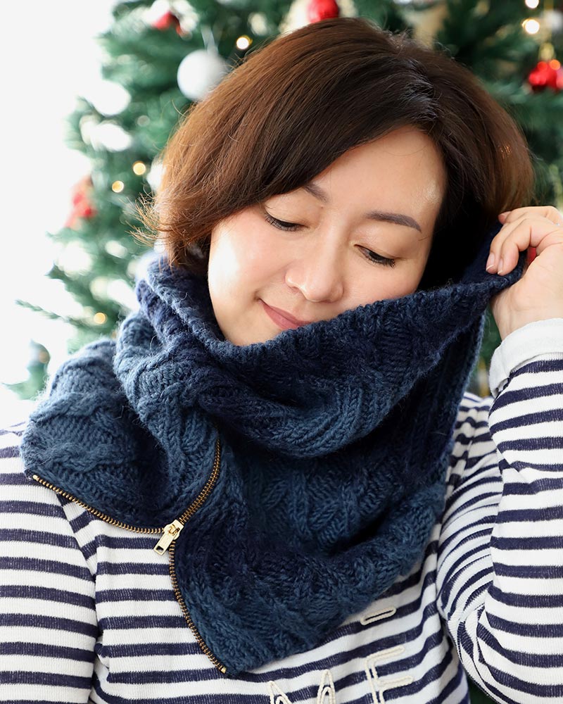 Discover how to knit a chic zipper cowl featuring intricate cable designs and stunning ombre effects.