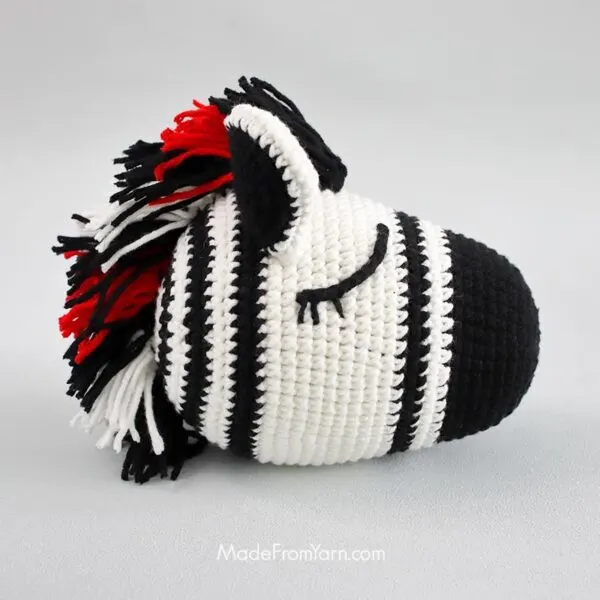 complete crochet zebra head with mane and ears.