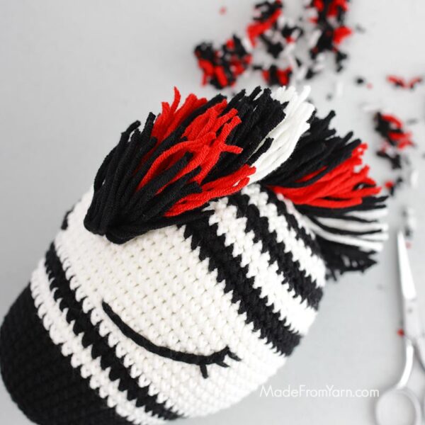 sew crochet mane to zebra's head