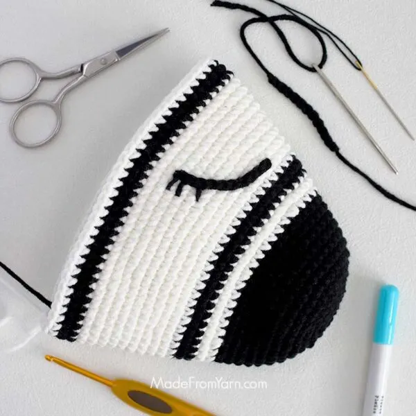 crochet zebra head with embroidered eyes