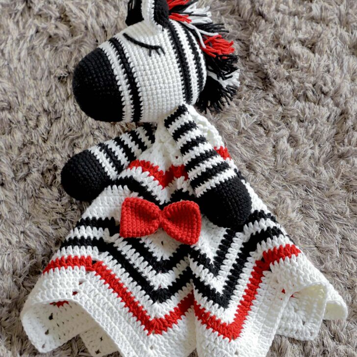 Learn how to make this simple, easy, and adorable Crochet Lovey Blanket. It's a wonderful baby shower gift for your little ones and expecting moms.