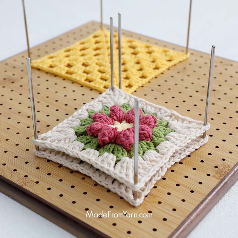 wooden pegged blocking board, perfect to shape granny squares to perfect size and square shape.