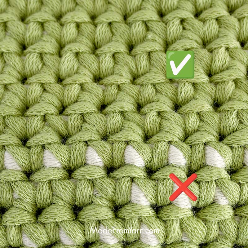 As you crochet over it, gently pull it to maintain a consistent tension, avoiding any loose or bunched-up strands.