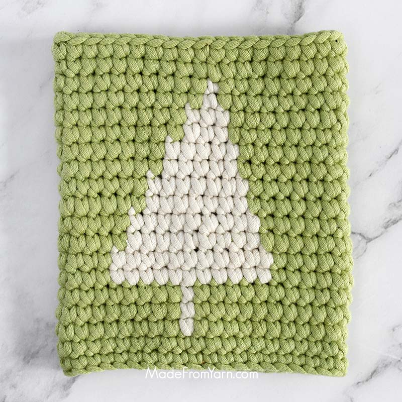 Let's demo this technique by creating a cozy using the tree pattern and the following written crochet pattern.